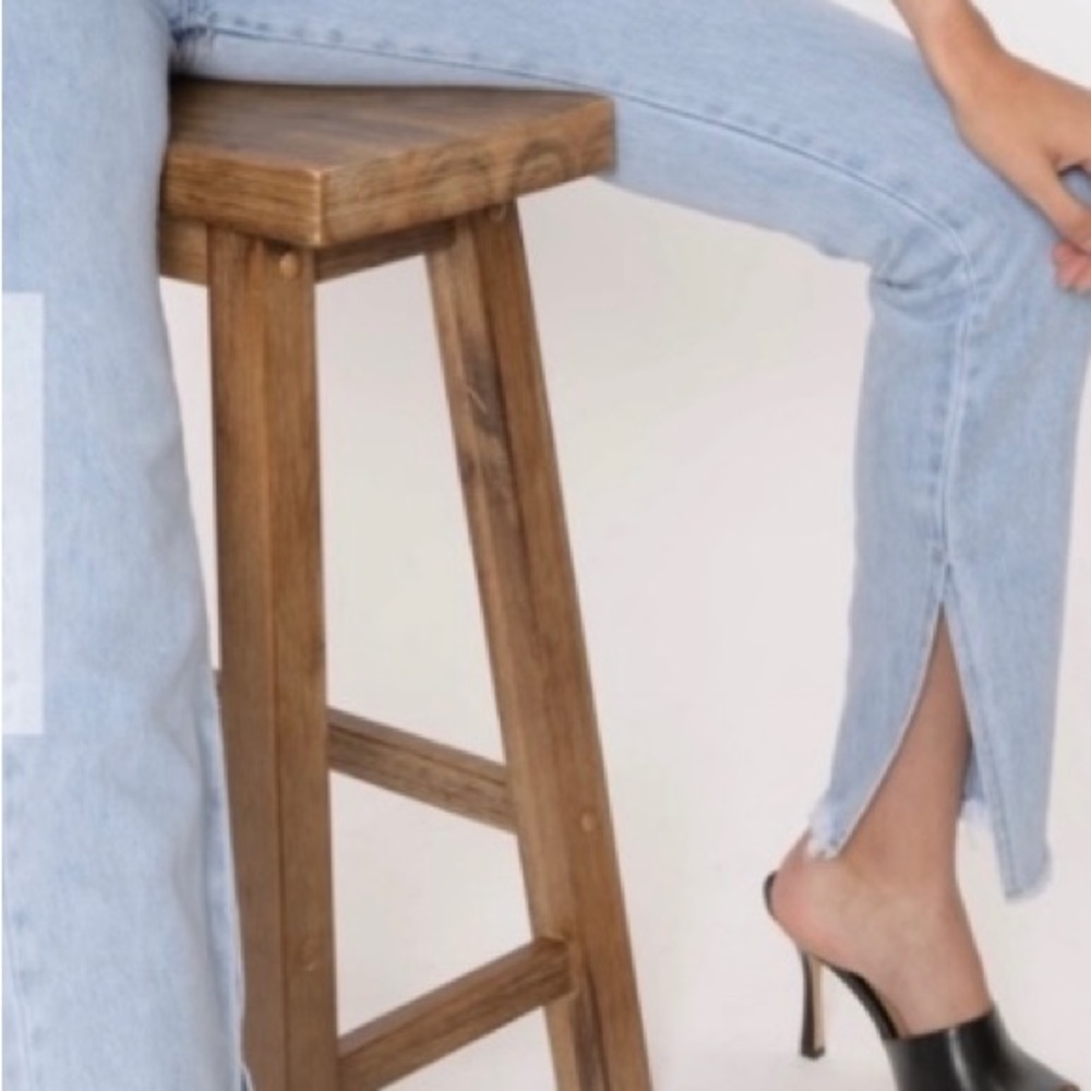 We wore what denim slit hem jeans, in light Blue Vintage .